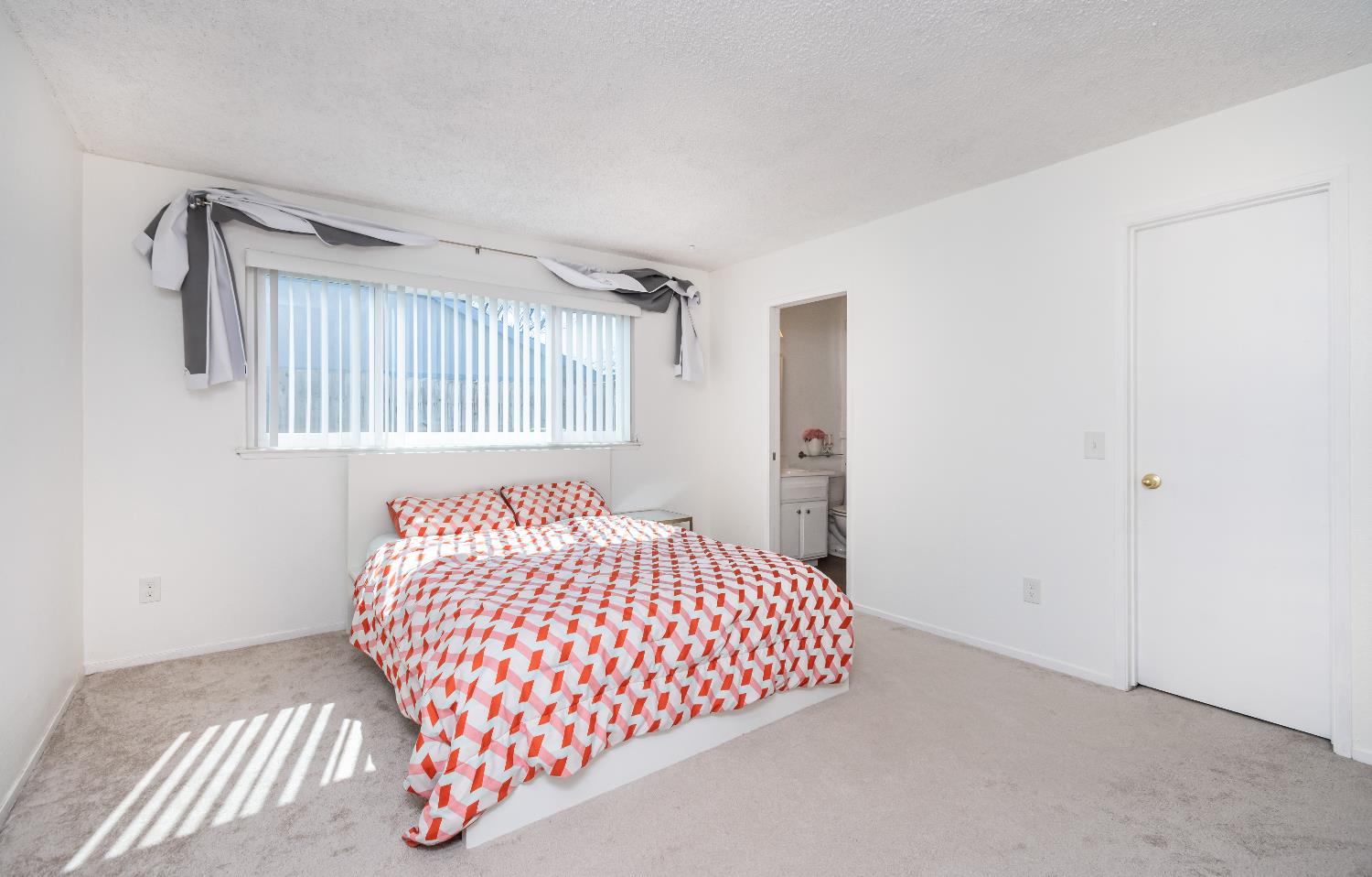 2000 Inglis Way, Unit A Roseville, CA 95678 - Photo 27 of 45 a bedroom with a bed and a window