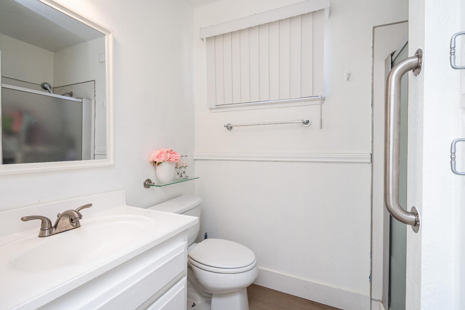 2000 Inglis Way, Unit A Roseville, CA 95678 - Photo 29 of 45 a bathroom with a sink toilet and shower