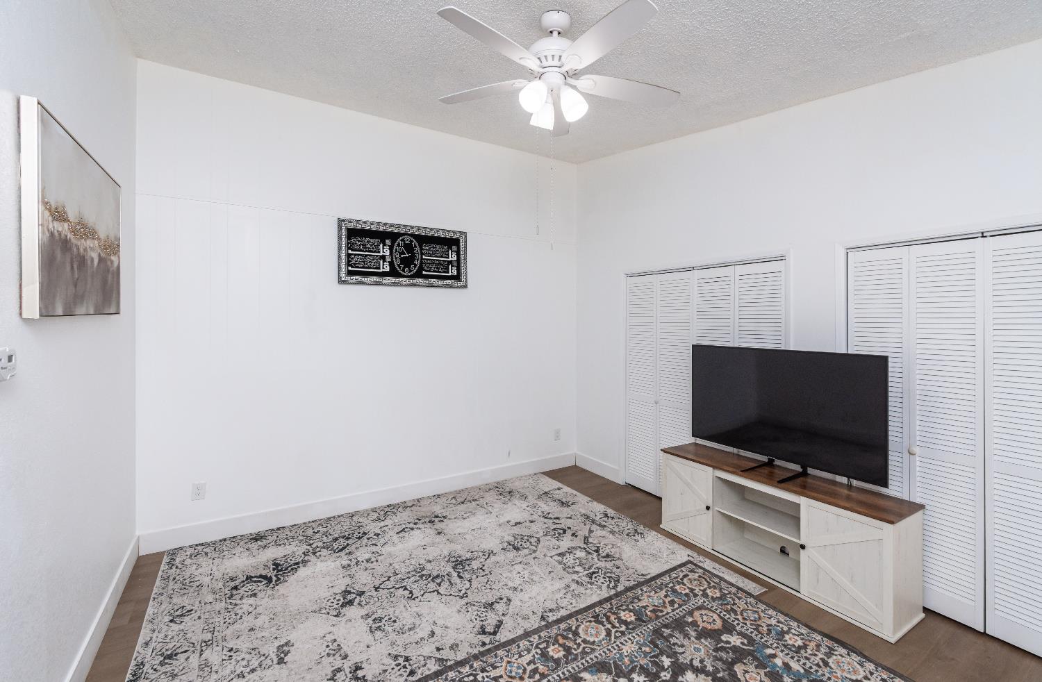 2000 Inglis Way, Unit A Roseville, CA 95678 - Photo 43 of 45 a room with a bed and a flat screen tv