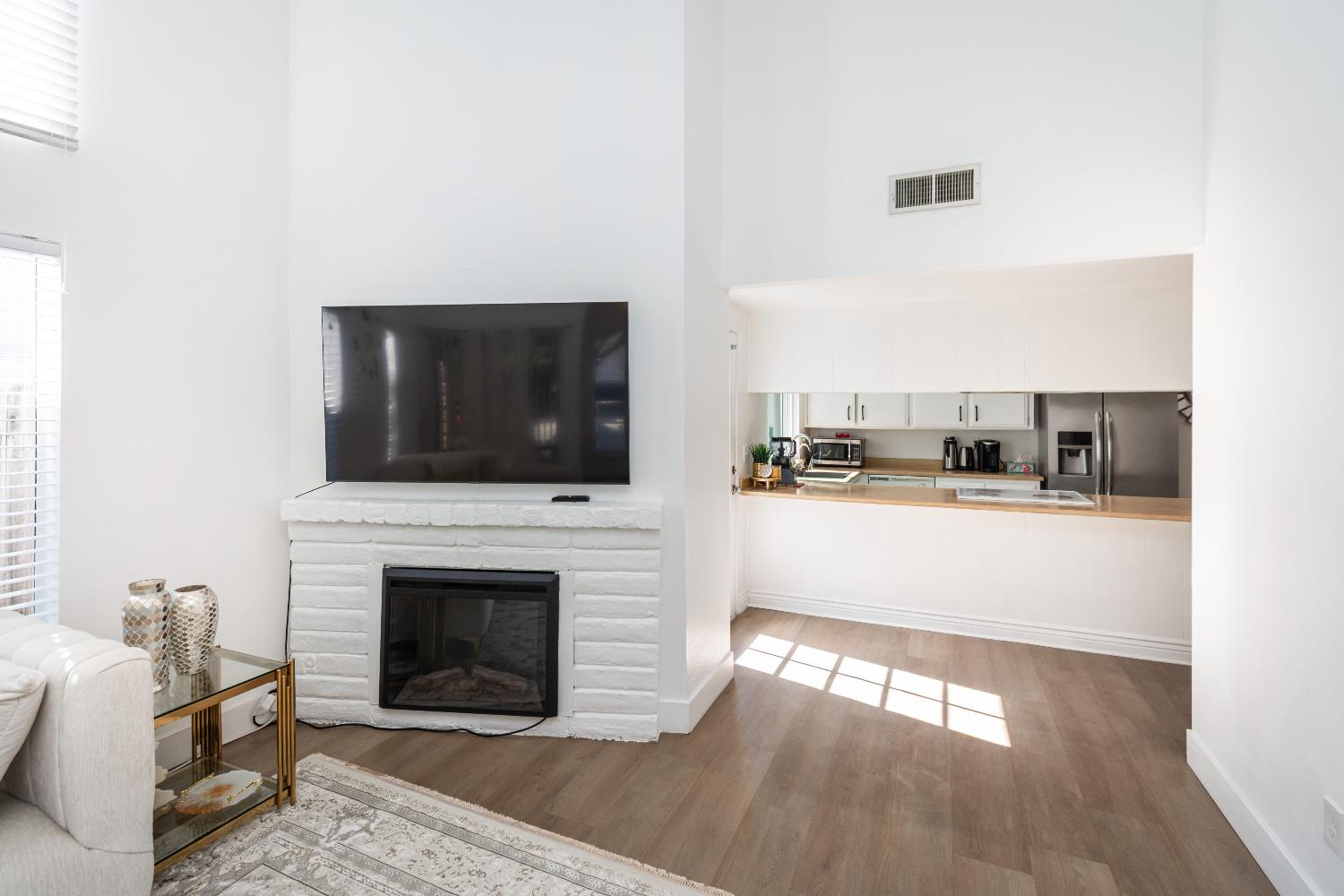 2000 Inglis Way, Unit A Roseville, CA 95678 - Photo 8 of 45 a living room with furniture fireplace and flat screen tv