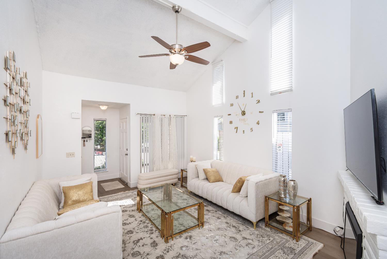 2000 Inglis Way, Unit A Roseville, CA 95678 - Photo 9 of 45 a living room with furniture and a flat screen tv