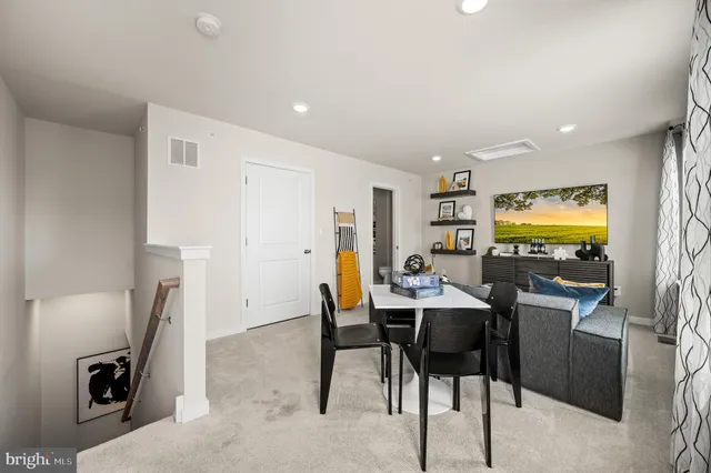 a view of a dining room with furniture