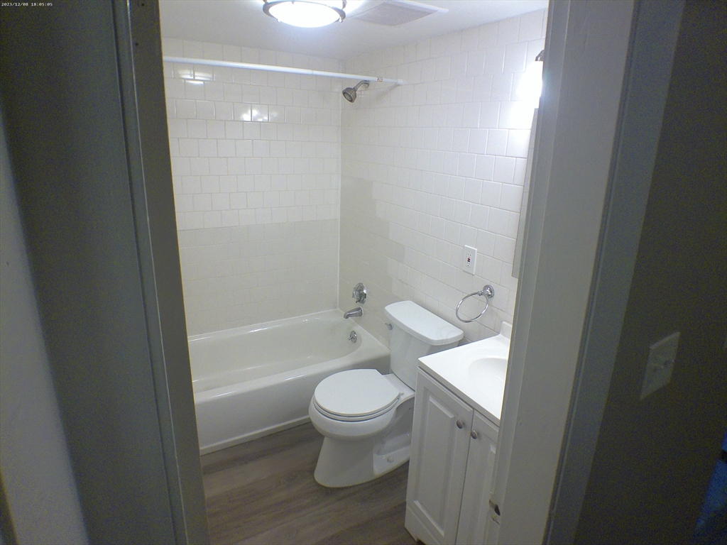 1862 Beacon Street, Unit 1B3 Brookline, MA 02445 - Photo 19 of 23 a bathroom with a toilet and a shower