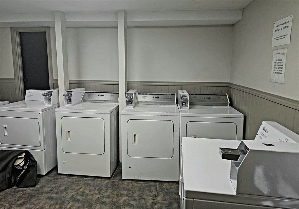 1862 Beacon Street, Unit 1B3 Brookline, MA 02445 - Photo 22 of 23 a utility room with dryer and washer