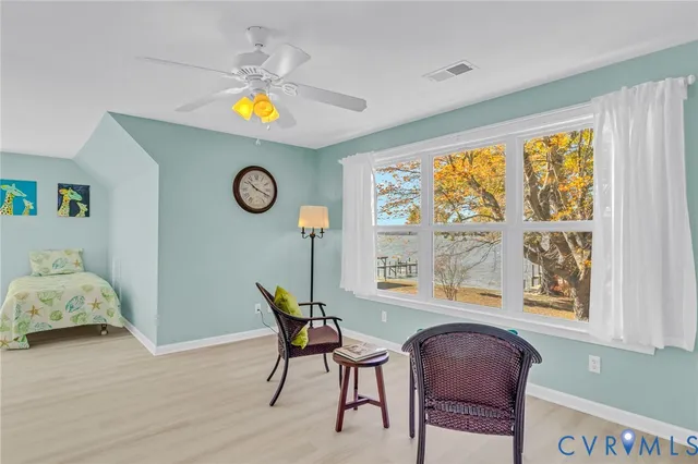 a view of dining room and wooden floor