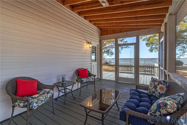 a view of a balcony with furniture