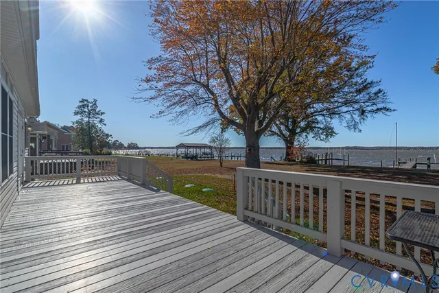 a view of outdoor space with deck and large trees