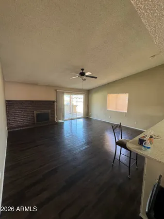 a view of livingroom with furniture wooden floor and window