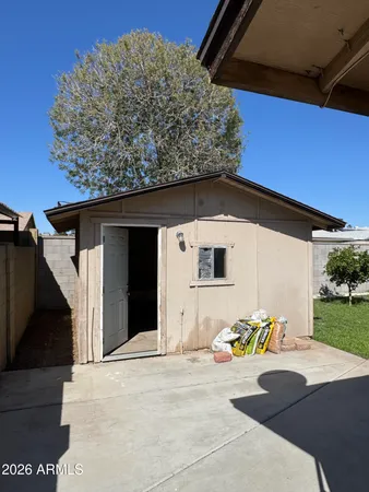 a view of a back yard of the house