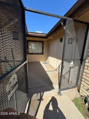 a view of a balcony with a door