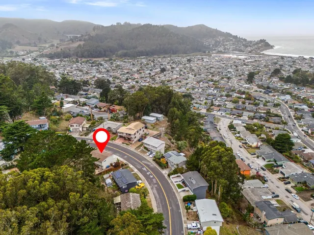 a view of city and mountain