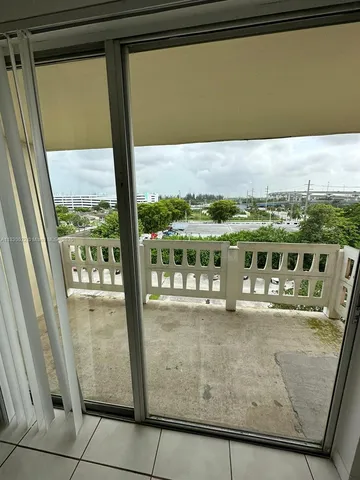 a view of a balcony with an outdoor space