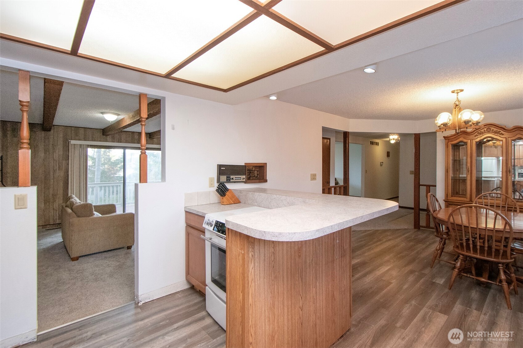 2131 West 7th Street Port Angeles, WA 98363 - Photo 12 of 40 a very nice looking dining room with a table chairs and a large window