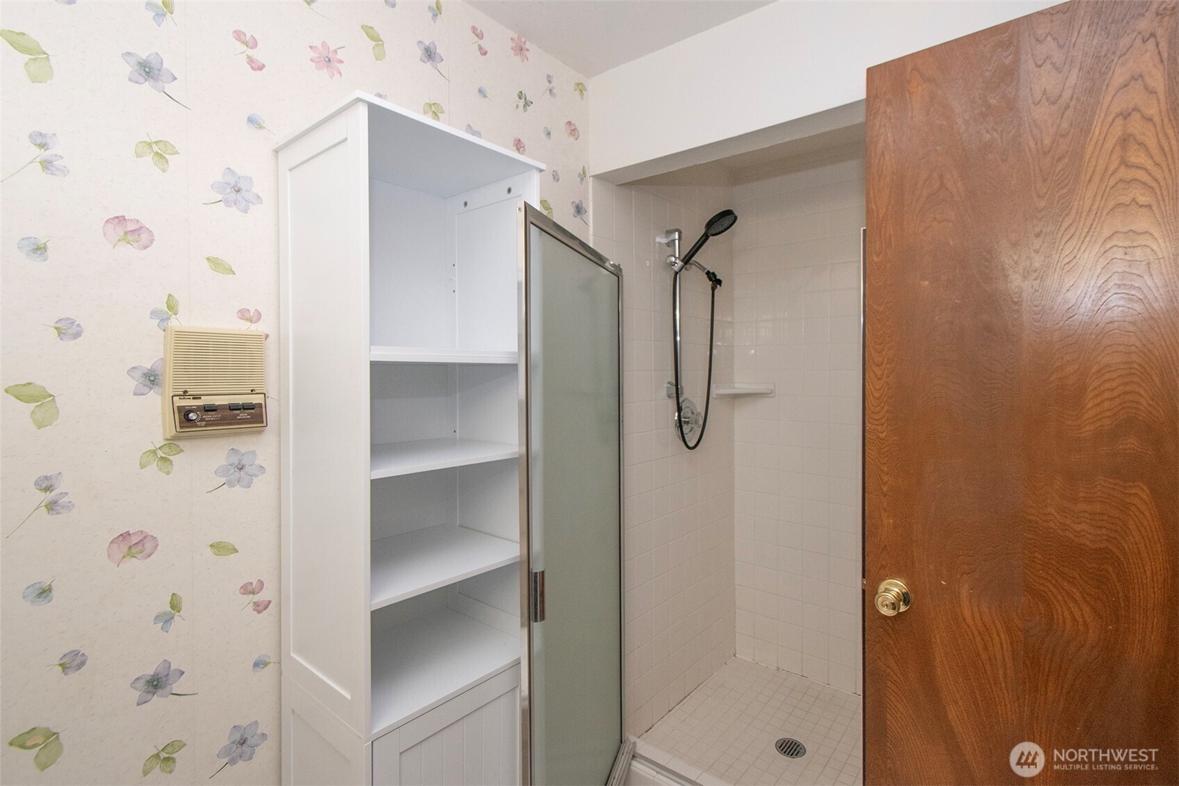 2131 West 7th Street Port Angeles, WA 98363 - Photo 21 of 40 a bathroom with a glass shower door