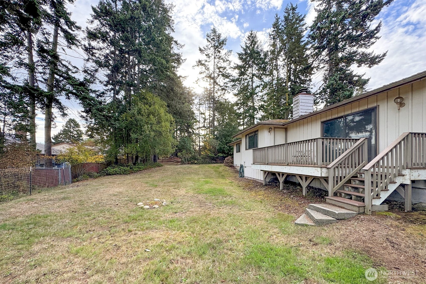 2131 West 7th Street Port Angeles, WA 98363 - Photo 39 of 40 a view of a house with a yard and sitting area