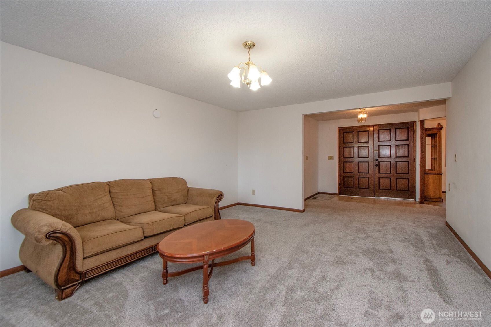 2131 West 7th Street Port Angeles, WA 98363 - Photo 5 of 40 a living room with furniture a ceiling fan and a window
