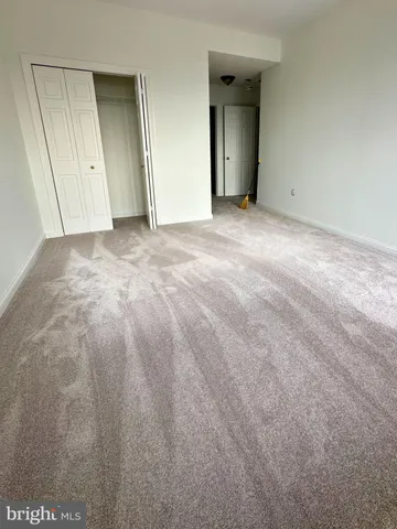 a view of a room with large windows