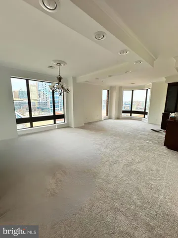a bathroom with a sink toilet and mirror
