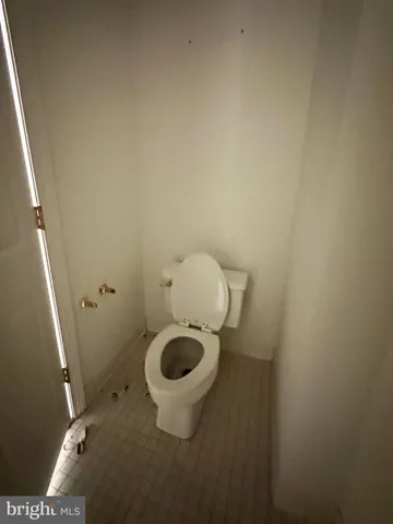 a kitchen with stainless steel appliances granite countertop a refrigerator and a stove