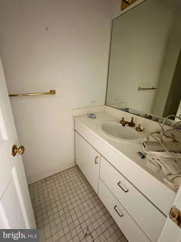 a kitchen with stainless steel appliances granite countertop a sink refrigerator and stove