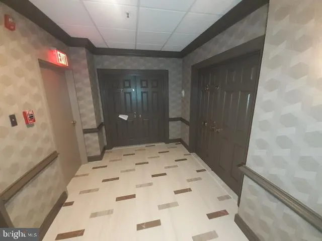 a bathroom with a sink and shower