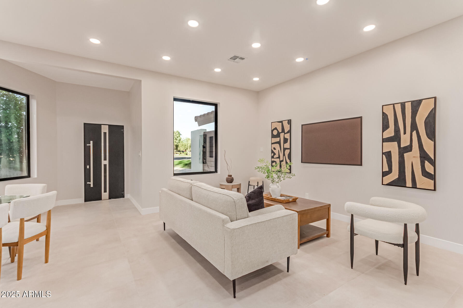 3301 East Rovey Avenue Paradise Valley, AZ 85253 - Photo 72 of 105 a living room with furniture and a window