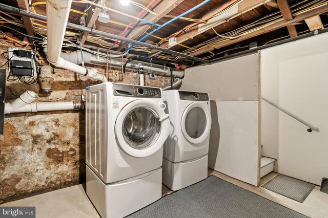 a utility room with dryer and washer