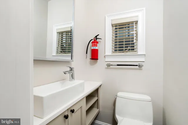a bathroom with a sink and a toilet