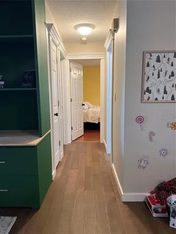 a view of a hallway view with staircase