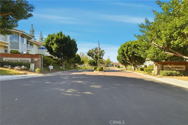 a view of a street with a house