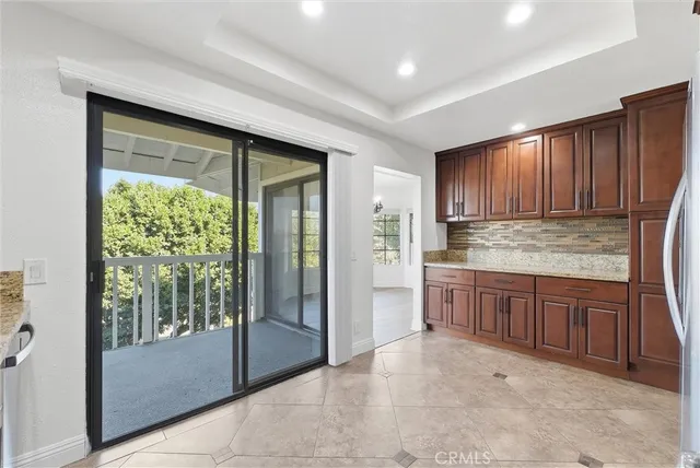 a large bathroom with a tub and shower
