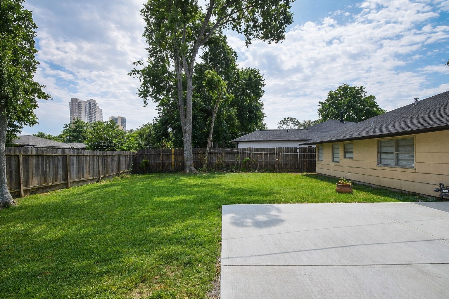 5330 Windswept Lane Houston, TX 77056 - Photo 17 of 20 a view of a house with a back yard