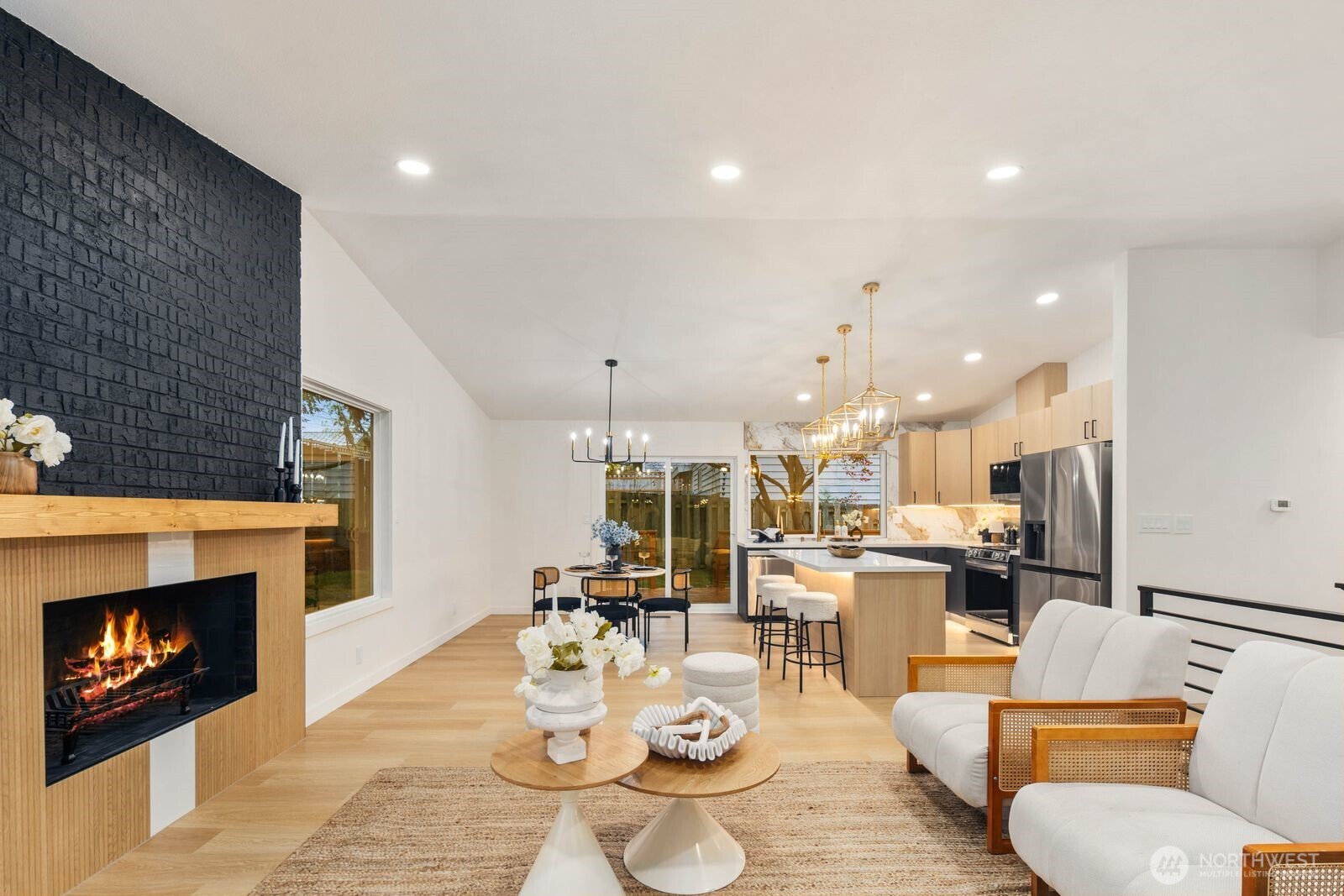 7211 182nd Street Southwest Edmonds, WA 98026 - Photo 12 of 40 a living room with lots of furniture and a fireplace