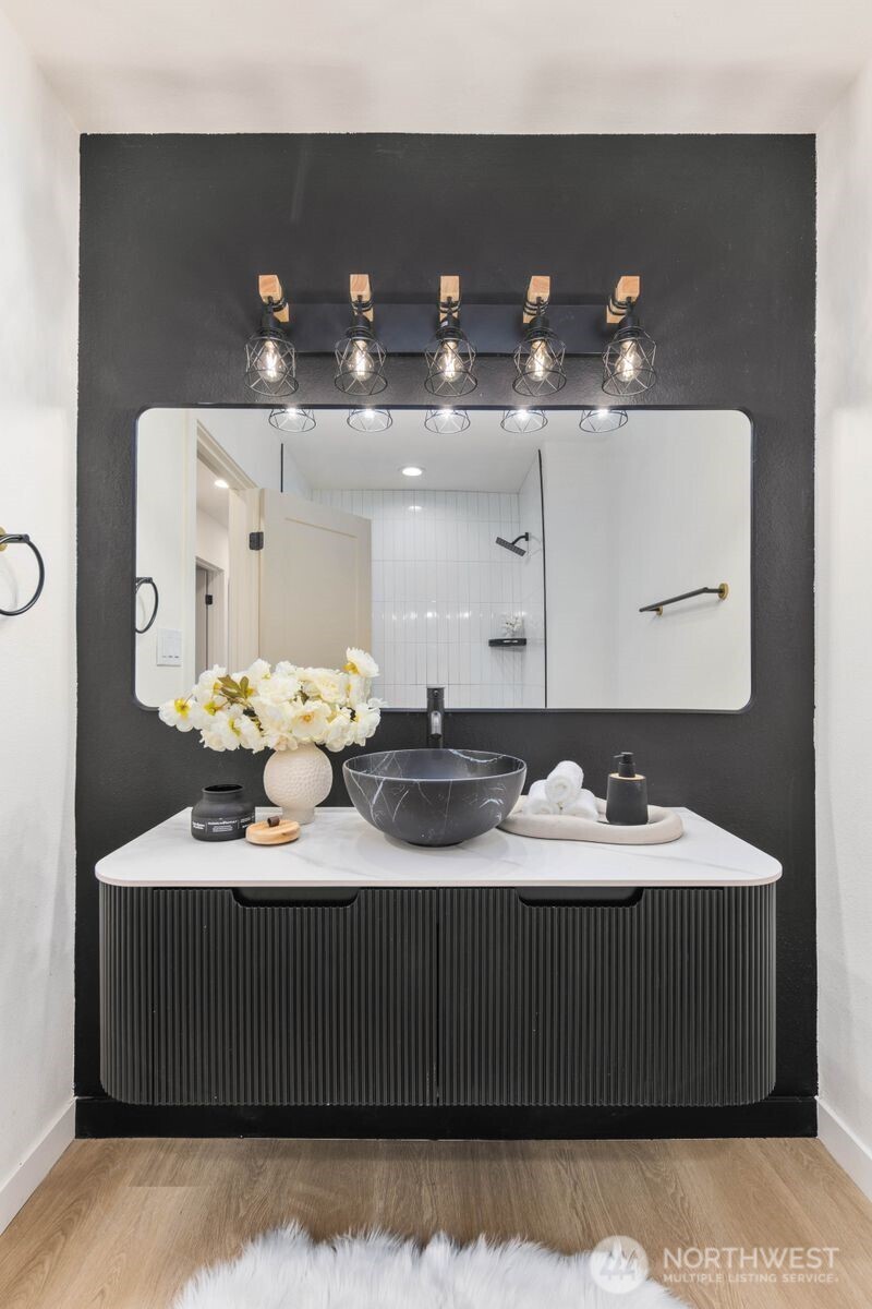7211 182nd Street Southwest Edmonds, WA 98026 - Photo 22 of 40 a bathroom with a sink vanity and mirror