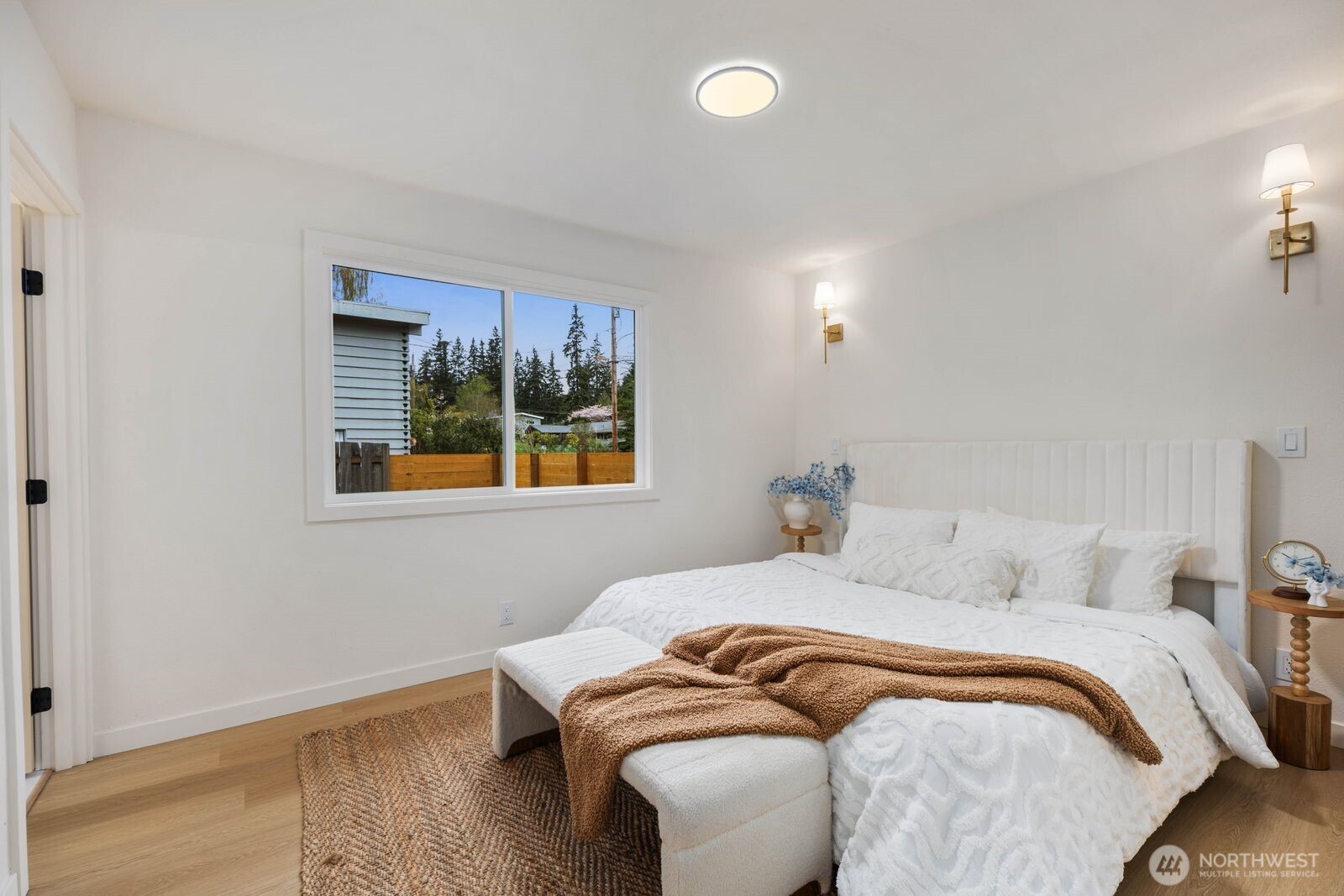 7211 182nd Street Southwest Edmonds, WA 98026 - Photo 24 of 40 a bedroom with a bed and a window