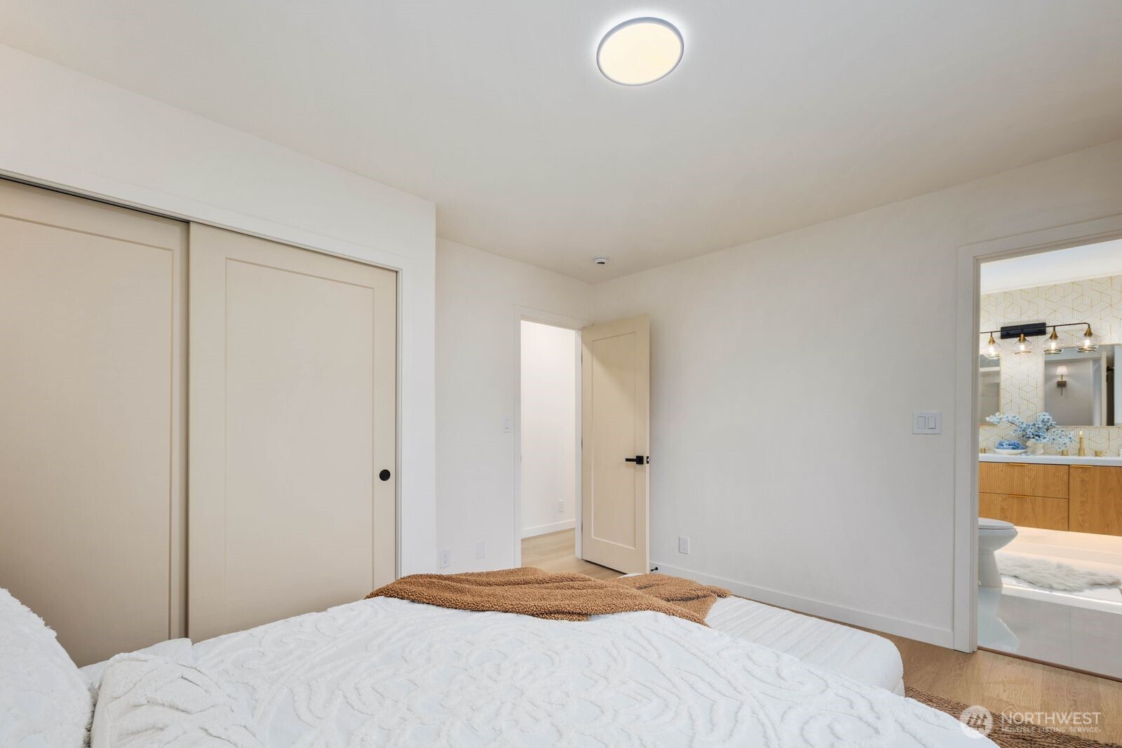 7211 182nd Street Southwest Edmonds, WA 98026 - Photo 25 of 40 a bedroom with a bed and bathroom