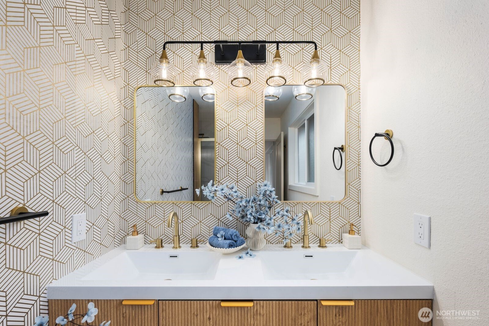 7211 182nd Street Southwest Edmonds, WA 98026 - Photo 27 of 40 a bathroom with a sink and a mirror