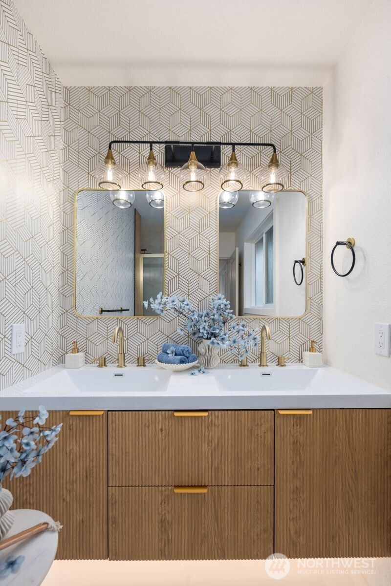 7211 182nd Street Southwest Edmonds, WA 98026 - Photo 28 of 40 a bathroom with a sink and a mirror