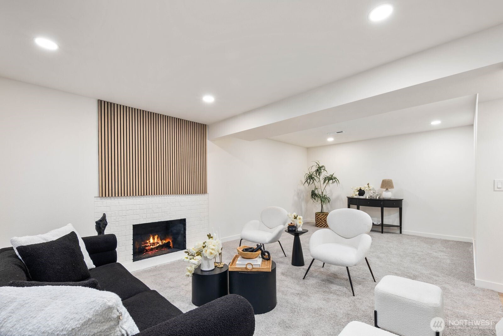 7211 182nd Street Southwest Edmonds, WA 98026 - Photo 33 of 40 a living room with furniture and a fireplace