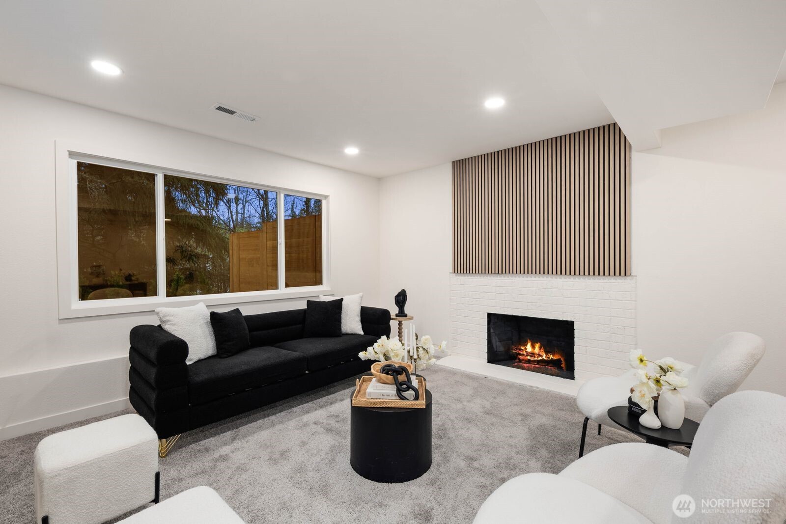 7211 182nd Street Southwest Edmonds, WA 98026 - Photo 34 of 40 a living room with furniture window and a fireplace