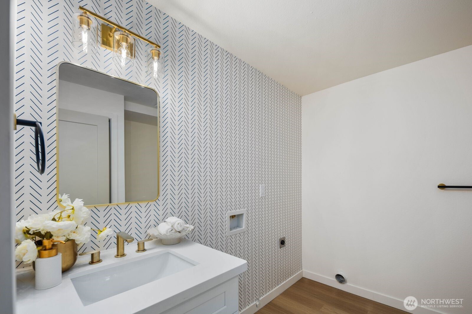 7211 182nd Street Southwest Edmonds, WA 98026 - Photo 35 of 40 a bathroom with a sink mirror and vanity