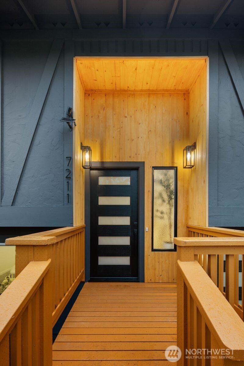 7211 182nd Street Southwest Edmonds, WA 98026 - Photo 6 of 40 a view of a balcony with furniture and a window