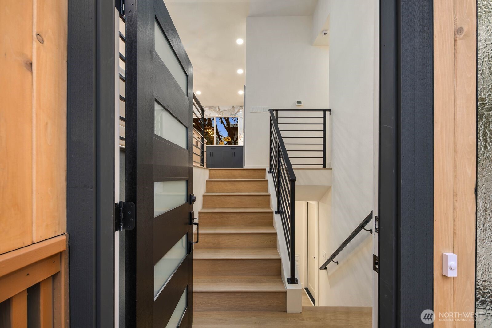 7211 182nd Street Southwest Edmonds, WA 98026 - Photo 7 of 40 a view of entryway and hall with wooden floor