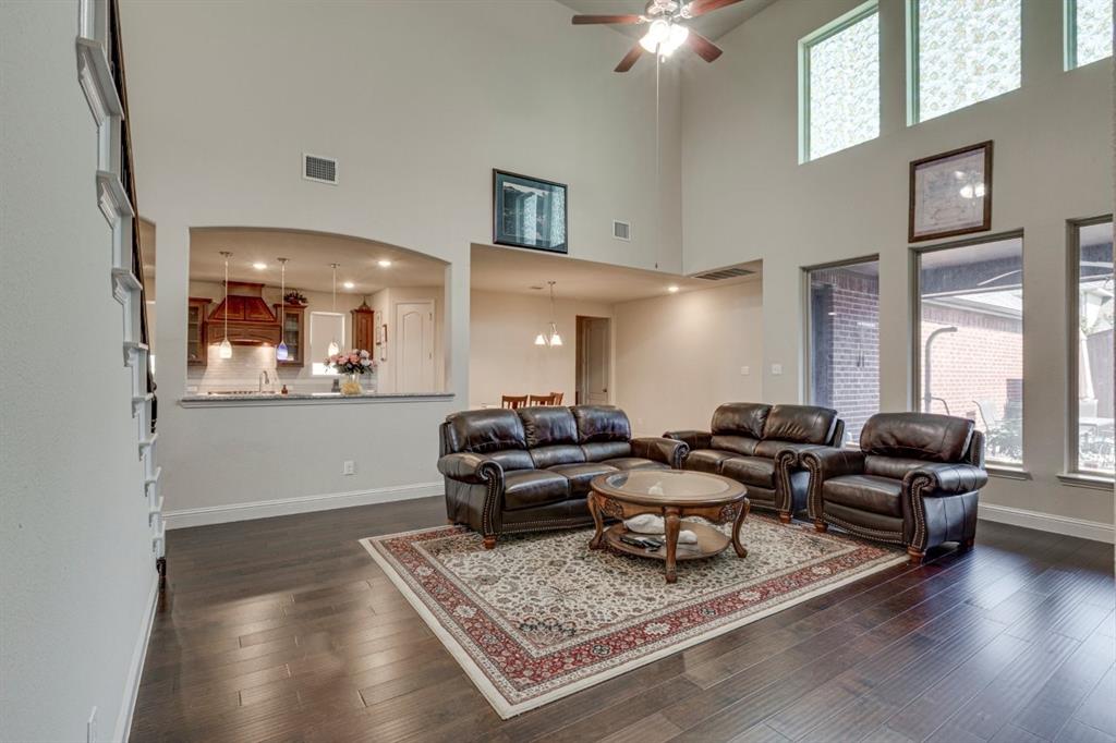 336 Red Hill Road Sunnyvale, TX 75182 - Photo 7 of 36 a living room with furniture and wooden floor