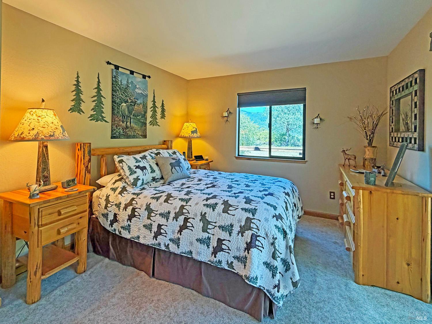 31312 High Point Road Potter Valley, CA 95469 - Photo 22 of 58 a bedroom with a bed and wooden floor