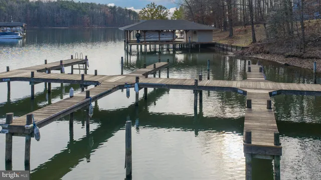 an aerial view of house with yard swimming pool and outdoor seating