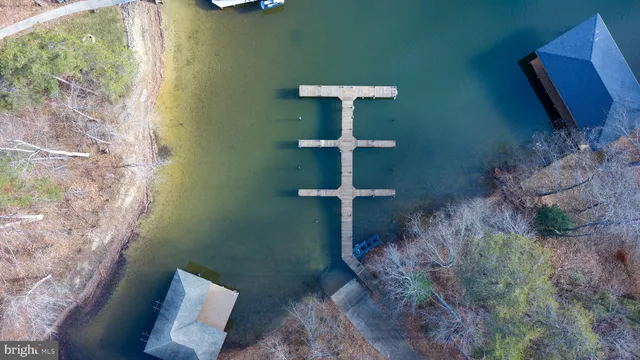 a sign that is on a brick wall