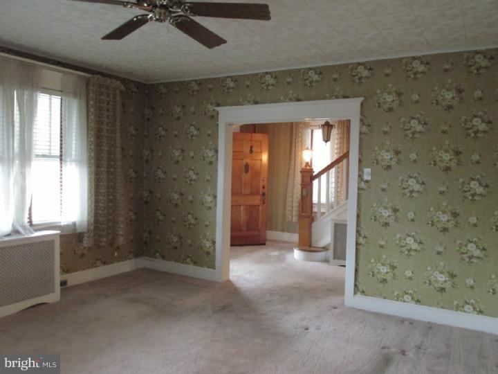 154 East Washington Street Riverside, NJ 08075 - Photo 3 of 20 wooden floor and window in an empty room