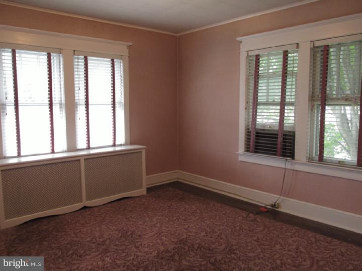154 East Washington Street Riverside, NJ 08075 - Photo 8 of 20 an empty room with a window