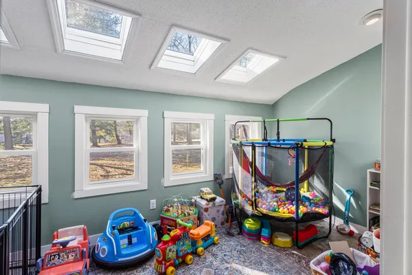 a room with toys and toys with wooden floor